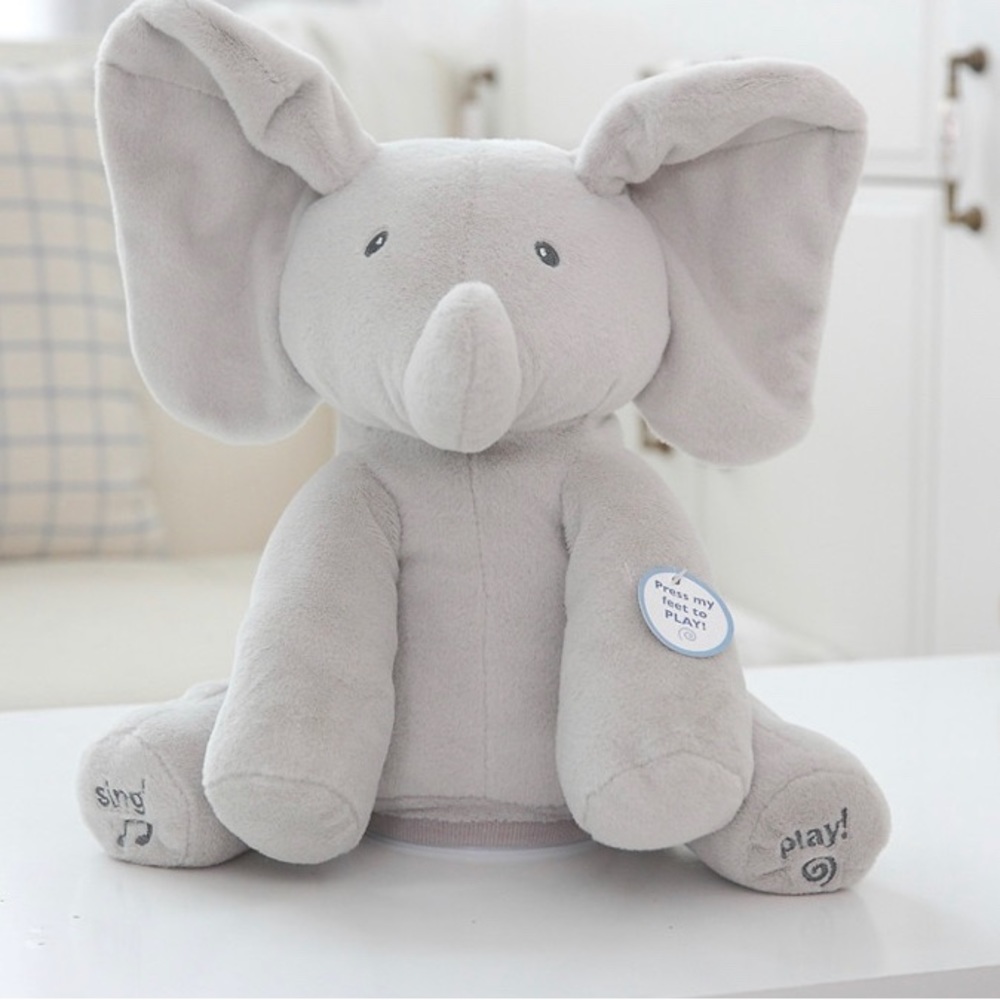 Peek-a-boo singing elephant. Bran new , my baby received two as gifts !